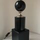 Philippe Barbier, Beautiful lamp to lay in black marble and chrome metal
