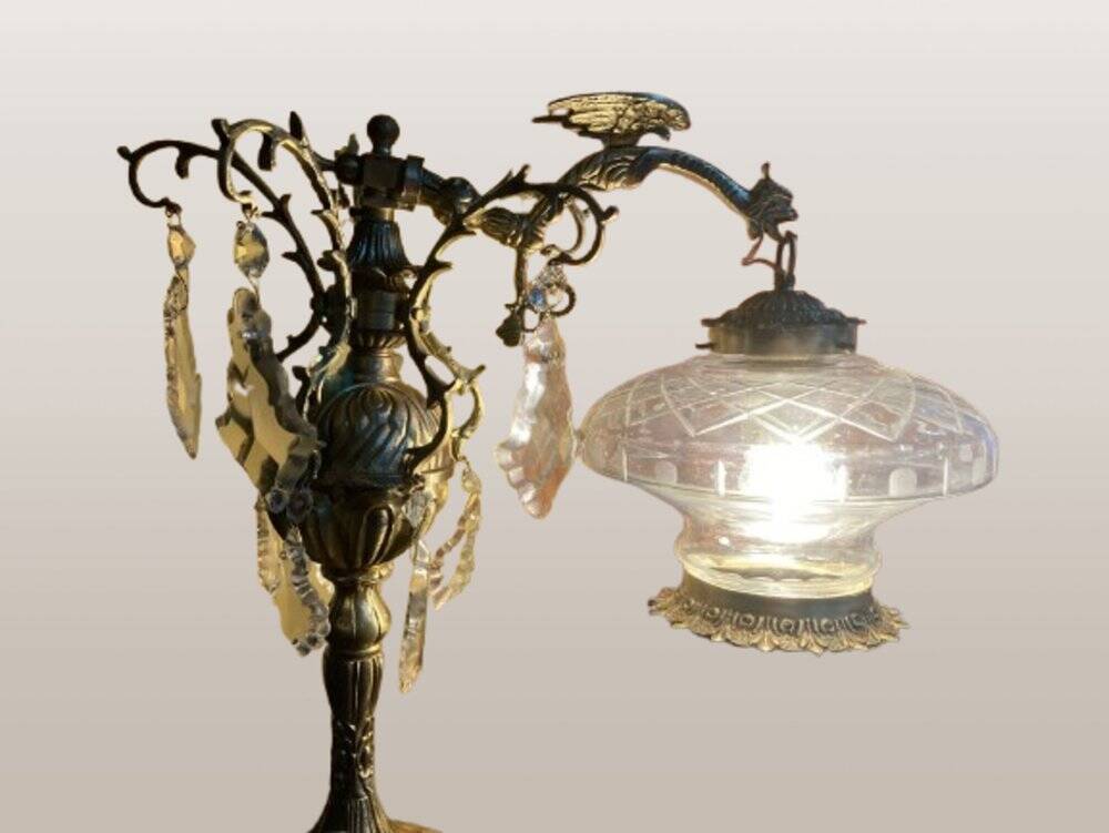 Bronze table lamp with dragon arm and cut glass shade, 1940s