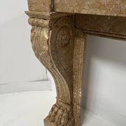 Napoleon III fireplace with claw feet in speckled marble, 19th century.