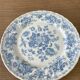 Four old blue plates