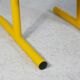 Adjustable seat chair. Circa 1980. Italy. Yellow lacquered steel.