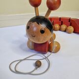 Vintage pulling toy, "centipede", 82 cm, made in Switzerland
