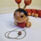 Vintage pulling toy, "centipede", 82 cm, made in Switzerland