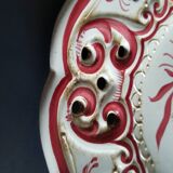 Old plates opened in handmade floral decoration