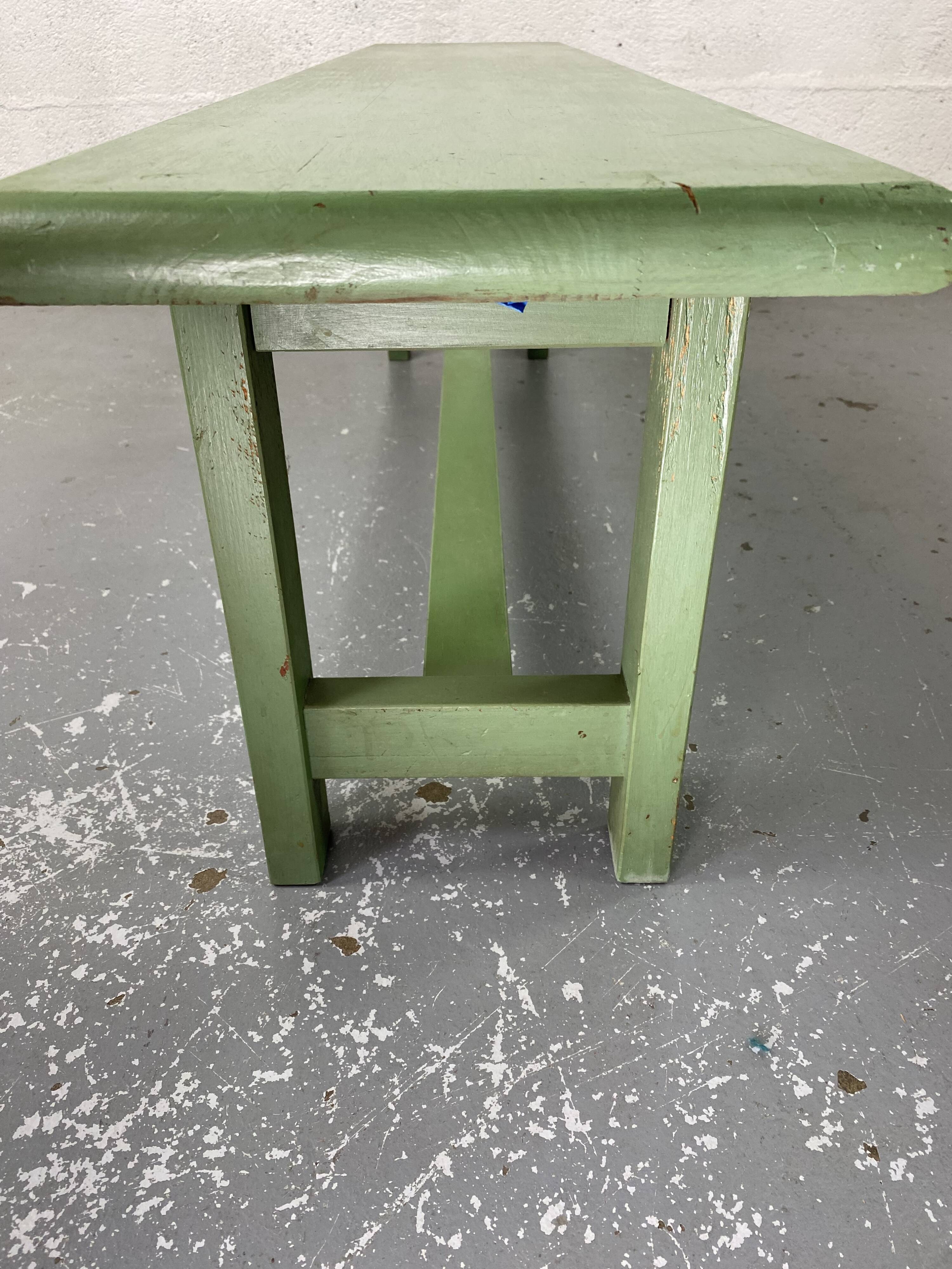 Green wooden bench