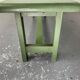 Green wooden bench