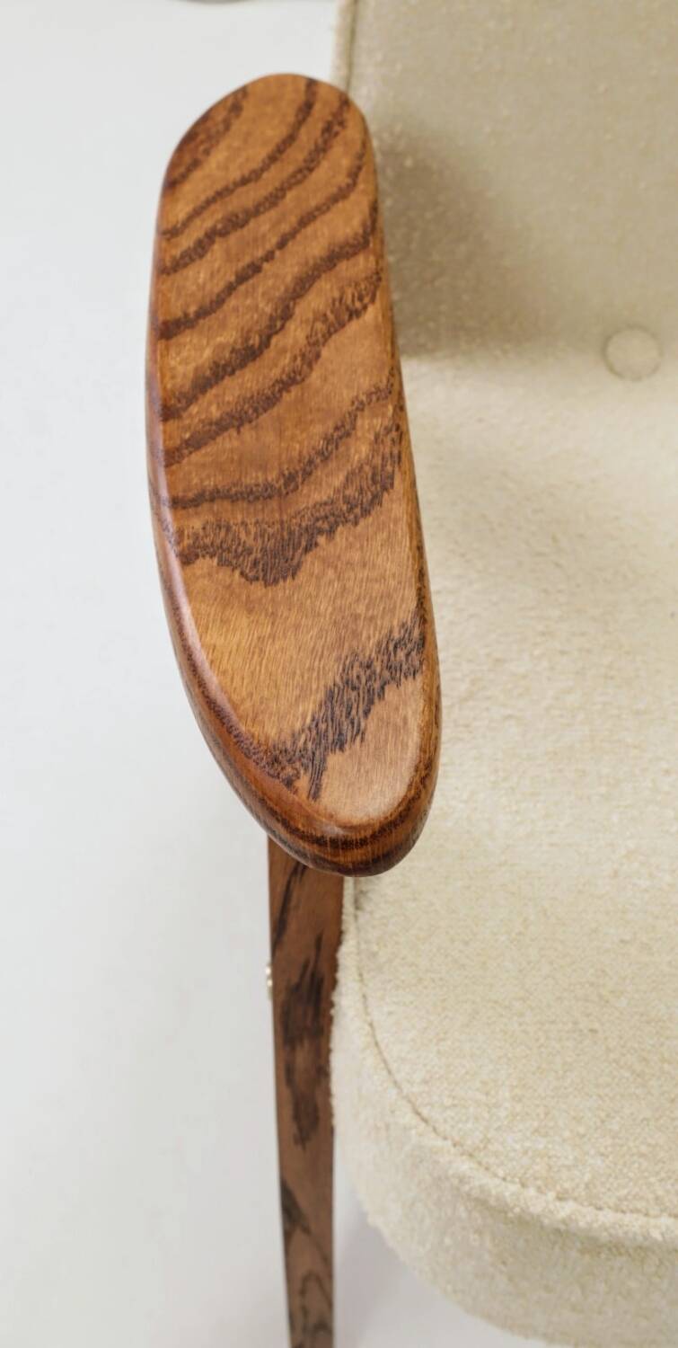 Vintage armchair with rustic wood and beige bouclé design by Chierowsky.