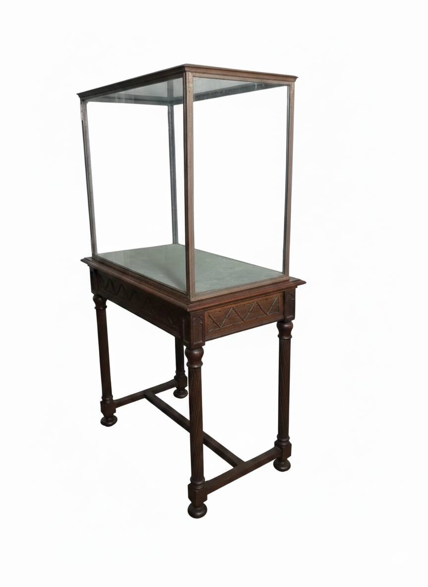 Antique display cabinet in 19th-century Gothic Revival style.