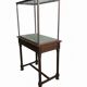 Antique display cabinet in 19th-century Gothic Revival style.