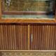Important showcase library in fine wood and marquetry, stamped.