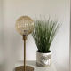 Table lamp with an antique golden streaked globe and a golden foot