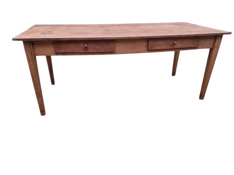 Old farmhouse table with two drawers.