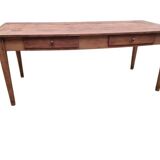 Old farmhouse table with two drawers.