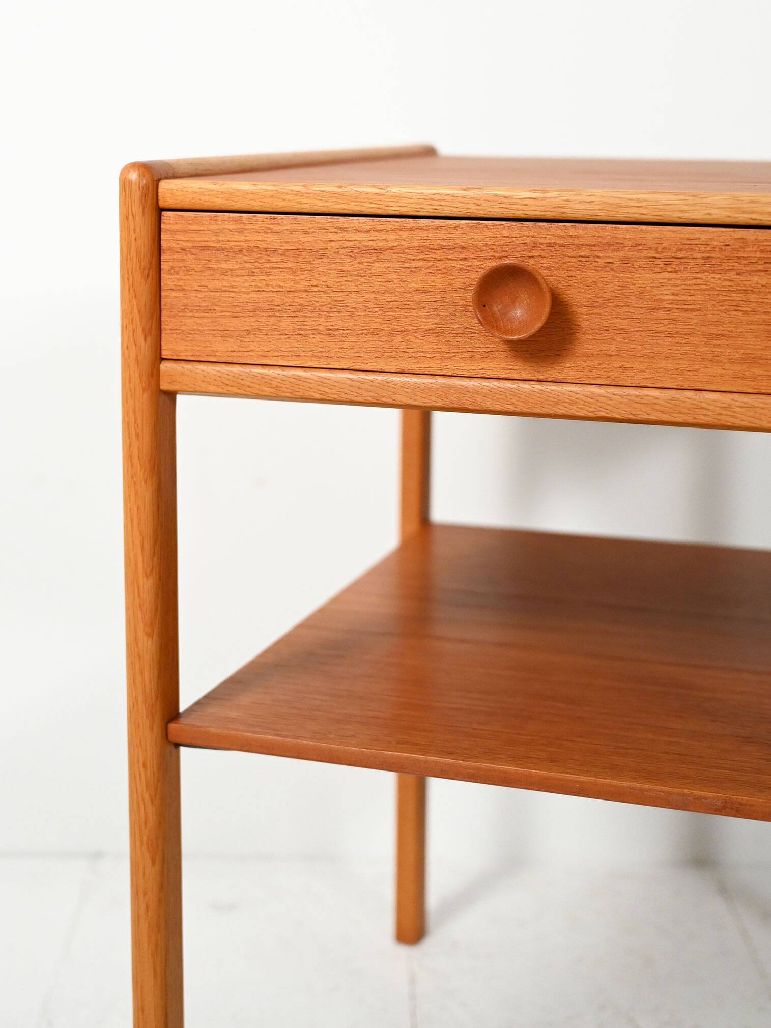 Pair of Scandinavian bedside tables from the 1950s–60s with carved handle