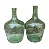 set of tinted glass demijohns