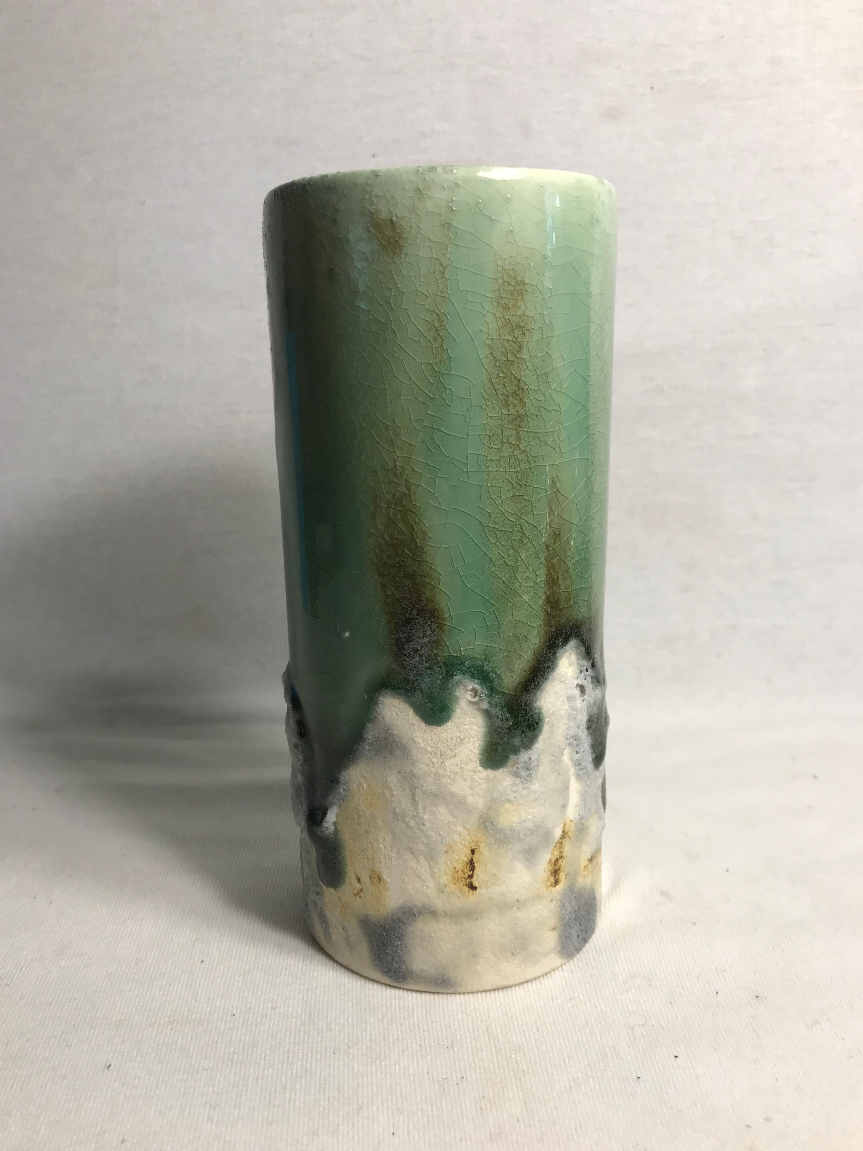 Roll old glazed ceramic vase green