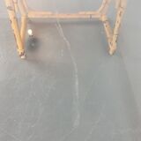1970s dining table with bamboo trestle legs and smoked glass
