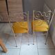 Pair of vintage golden designer chairs from the 50s