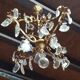 Bronze chandelier with stamps