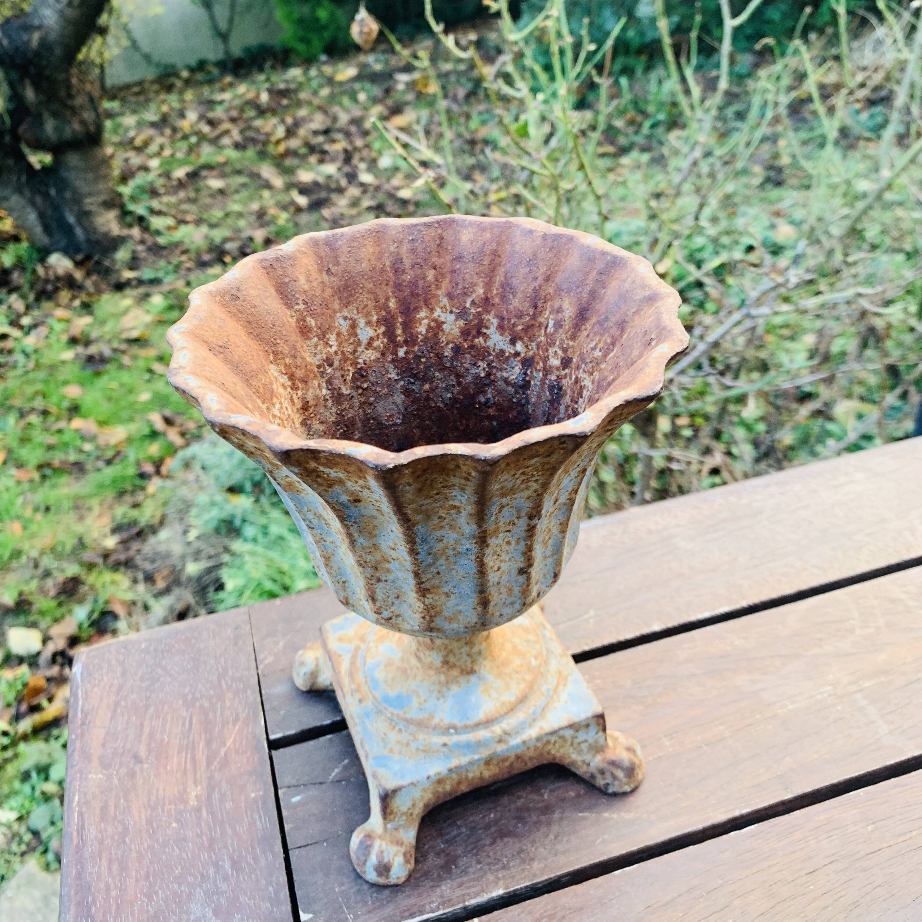 Small cast iron vase