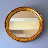 Round golden mirror