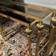 Series of 3 empire style nesting tables in brass and glass