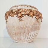 Terracotta pot cache golden flowers