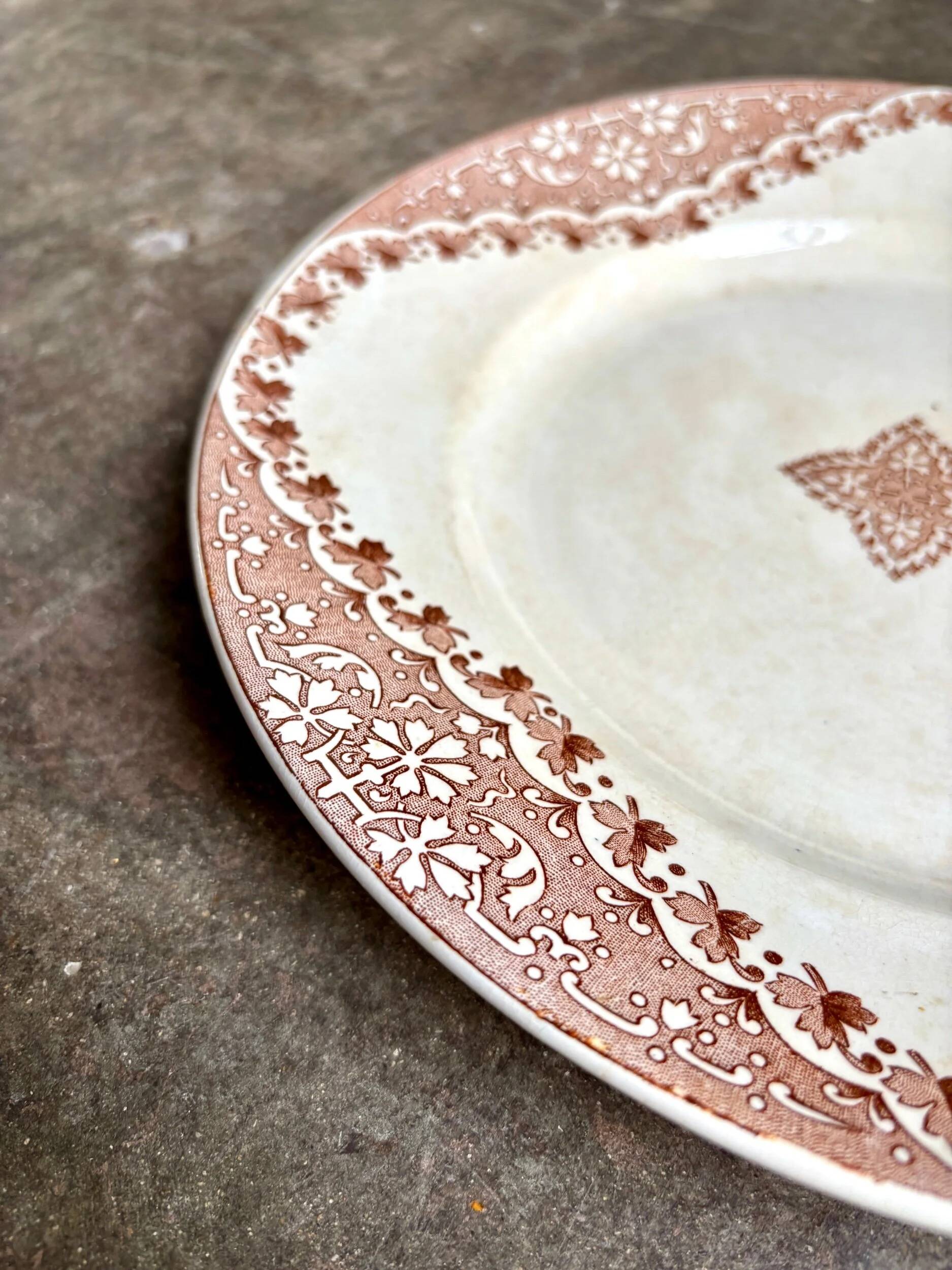 Longwy round dish in brown ironstone, "Andalous" service