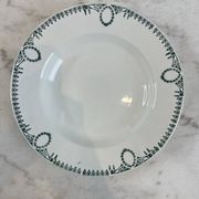 Set of 7 deep plates in earthenware, decorated with a green frieze.