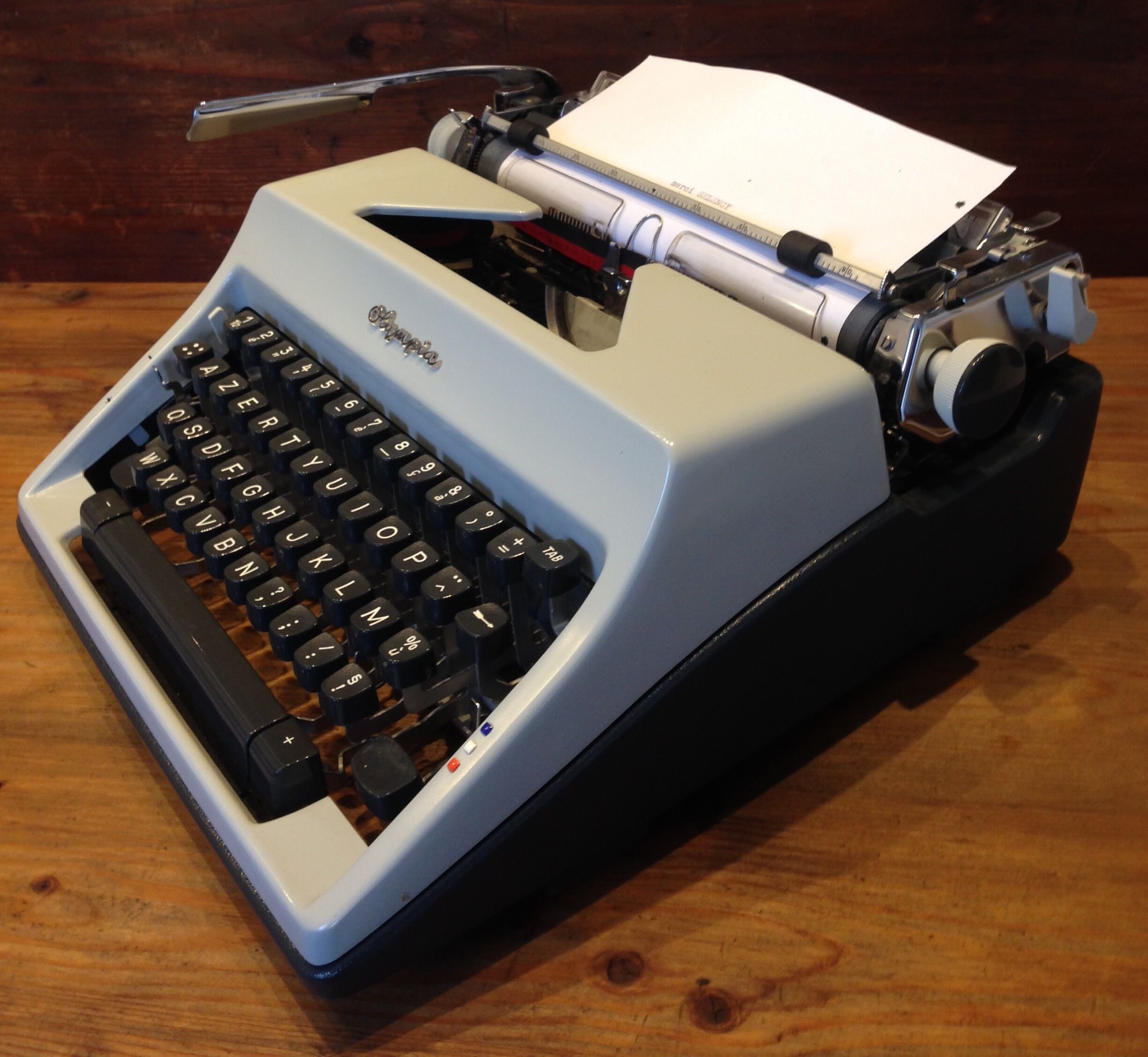 Typewriter olympia sm9 and leather briefcase