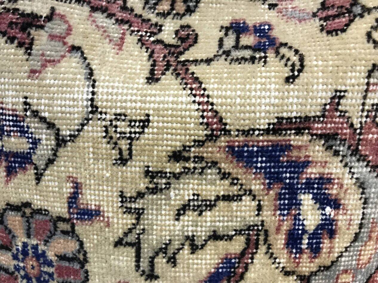 Coussin en tapis vintage fait main
