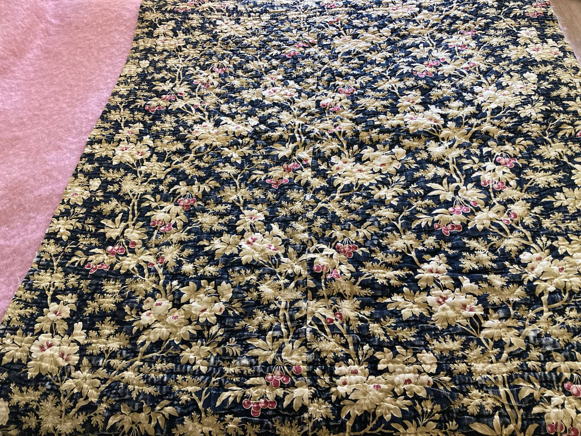 Antique hand-stitched boutis bedspread, floral fabric, 19th century.