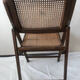 Pair of folding chairs in cane and dark wood