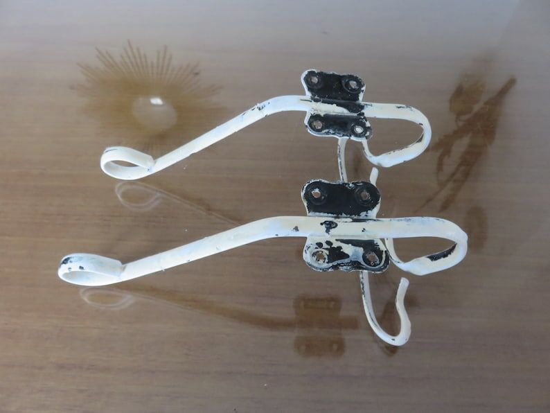 Pair of white metal hooks 30s 40s
