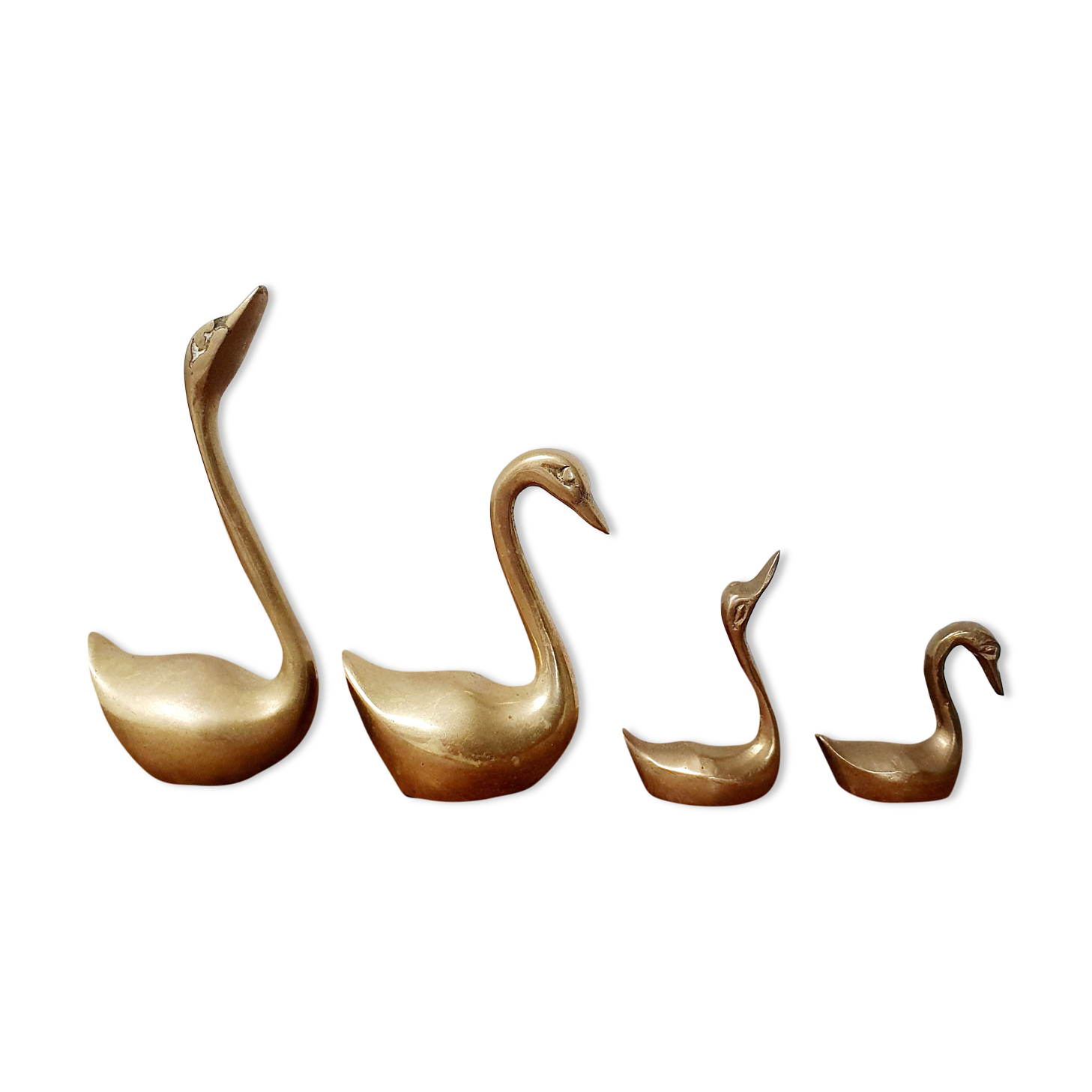 Brass swan family