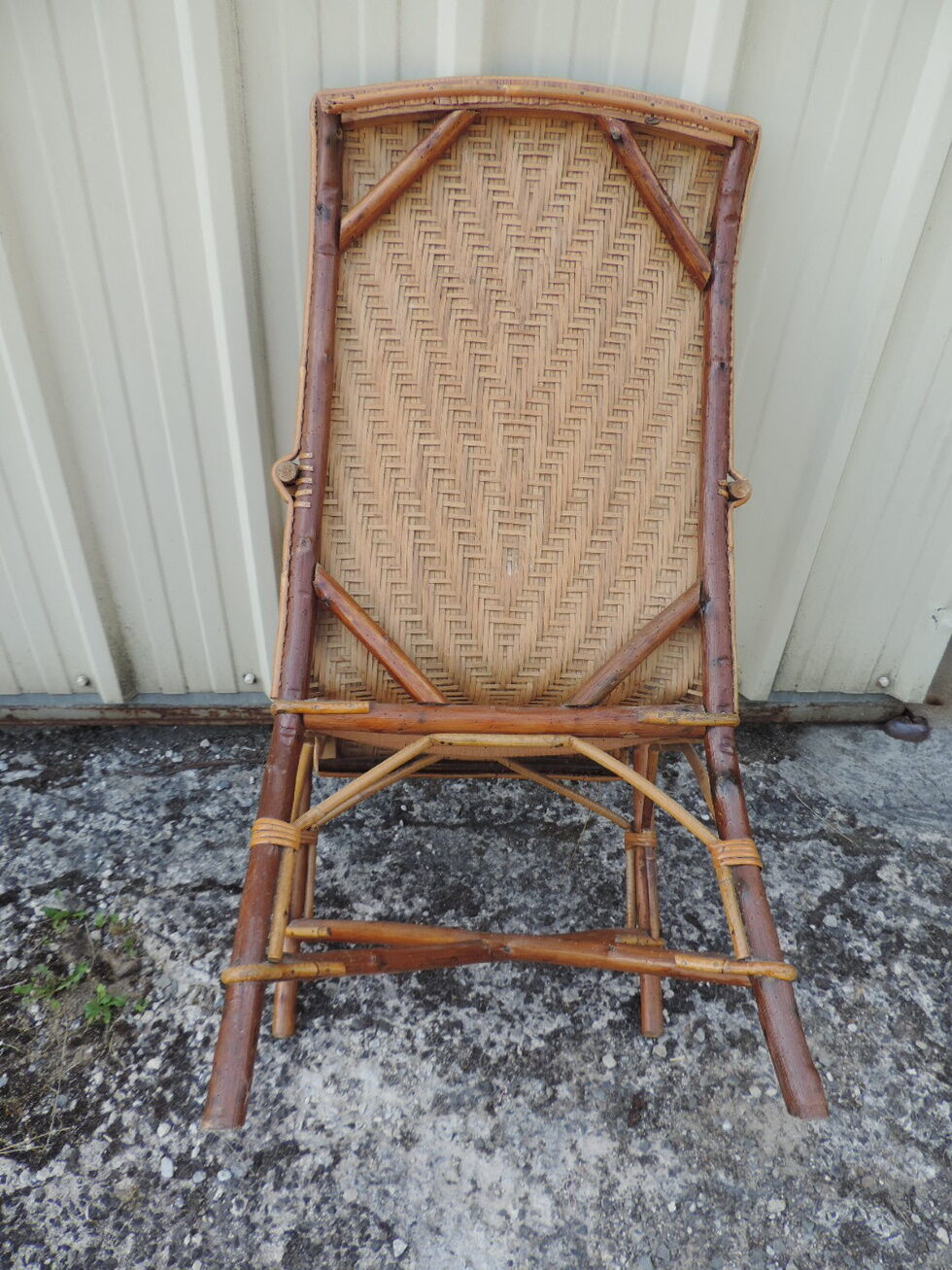 Rattan armchair with high backrest