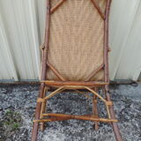 Rattan armchair with high backrest