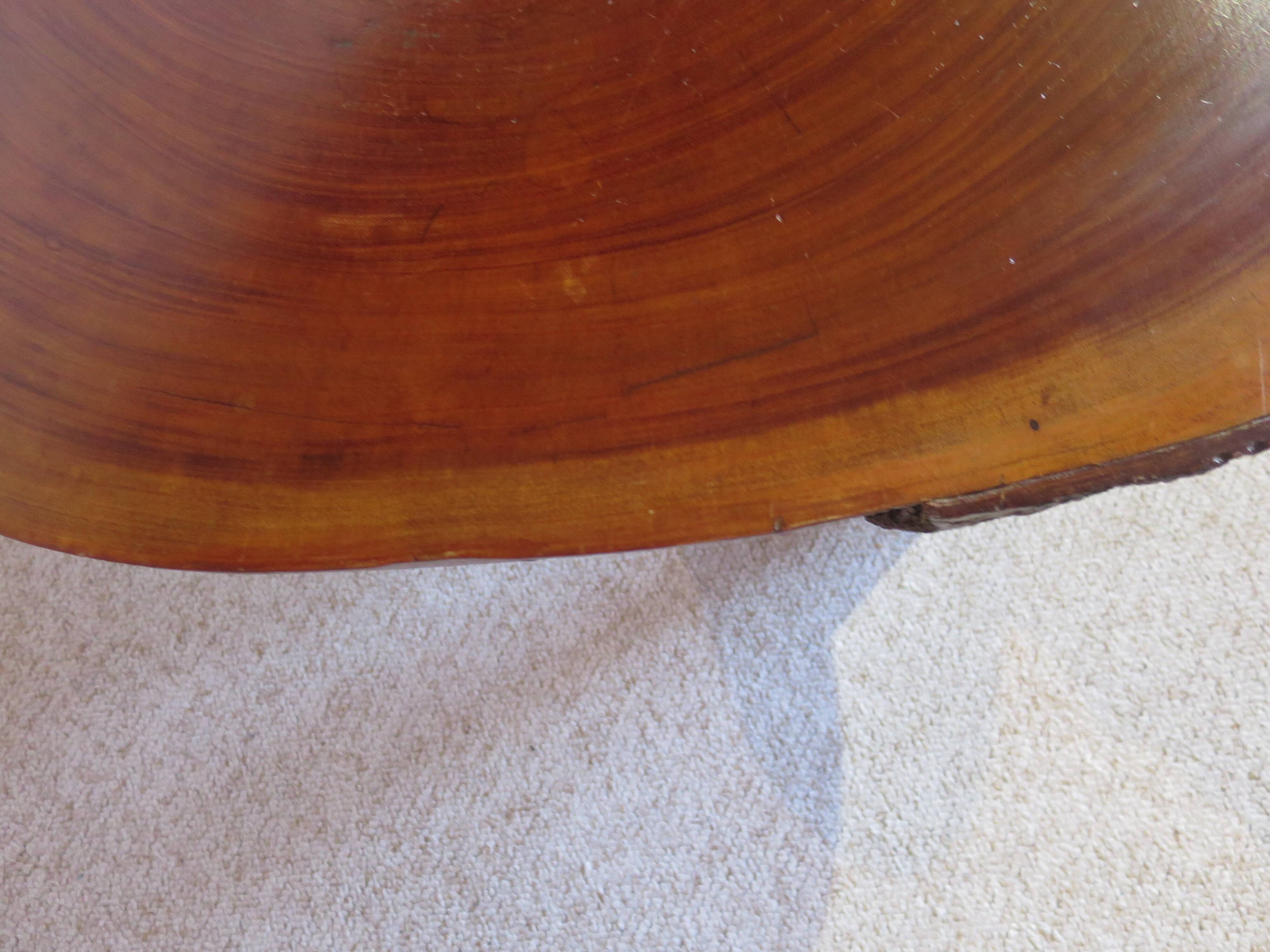 Tripod coffee table - solid okoumé wood - organic shape - brutalist style