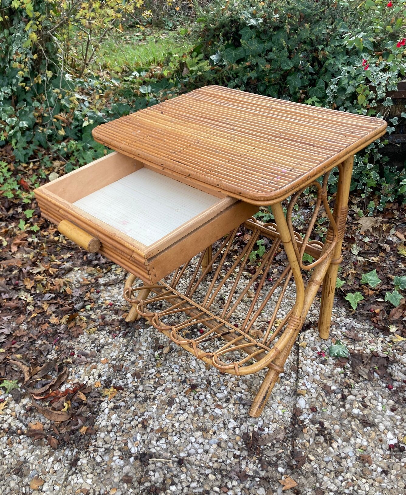 Vintage rattan magazine rack table