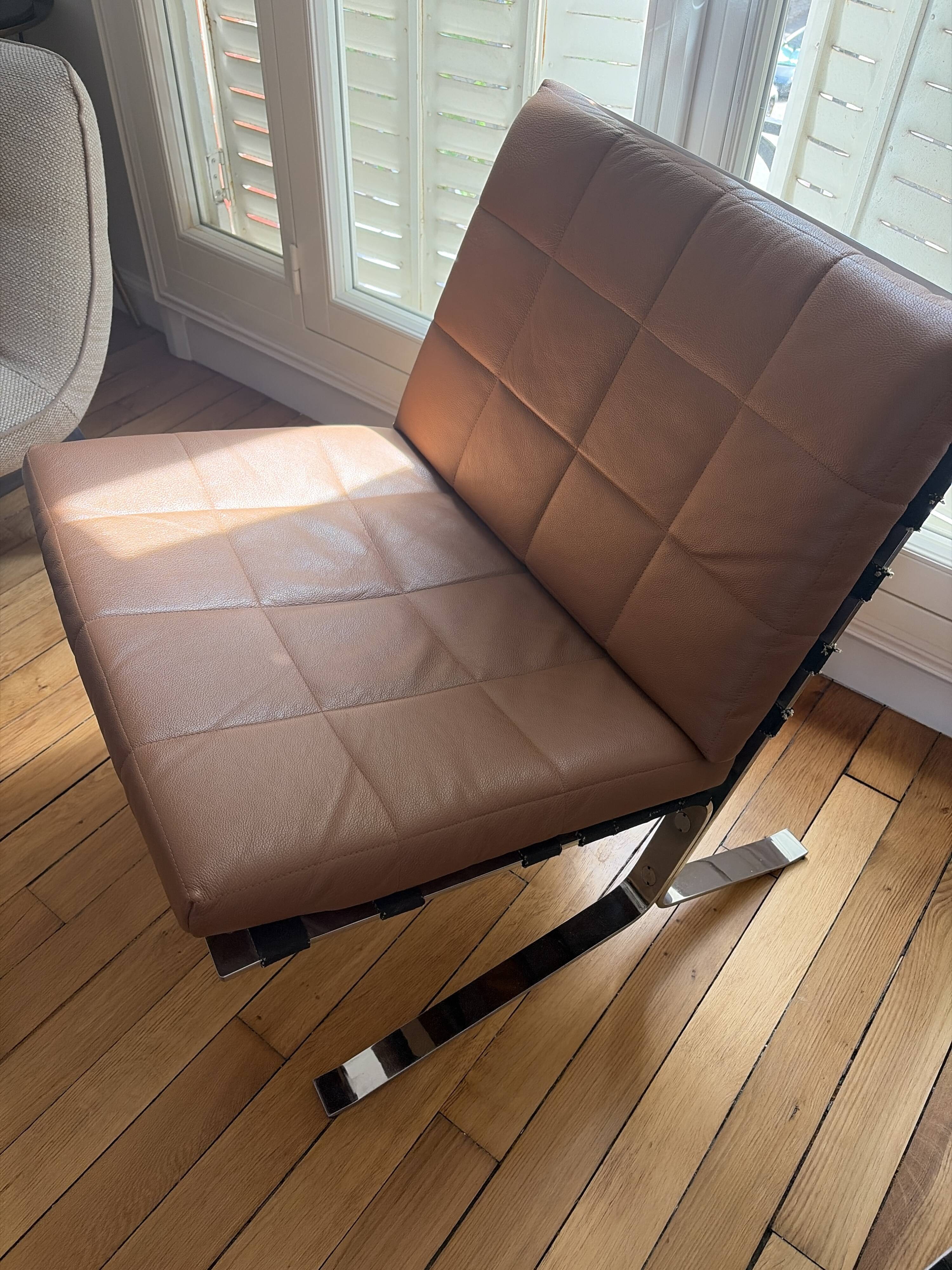 Armchairs and footrests by Olivier Mourgue