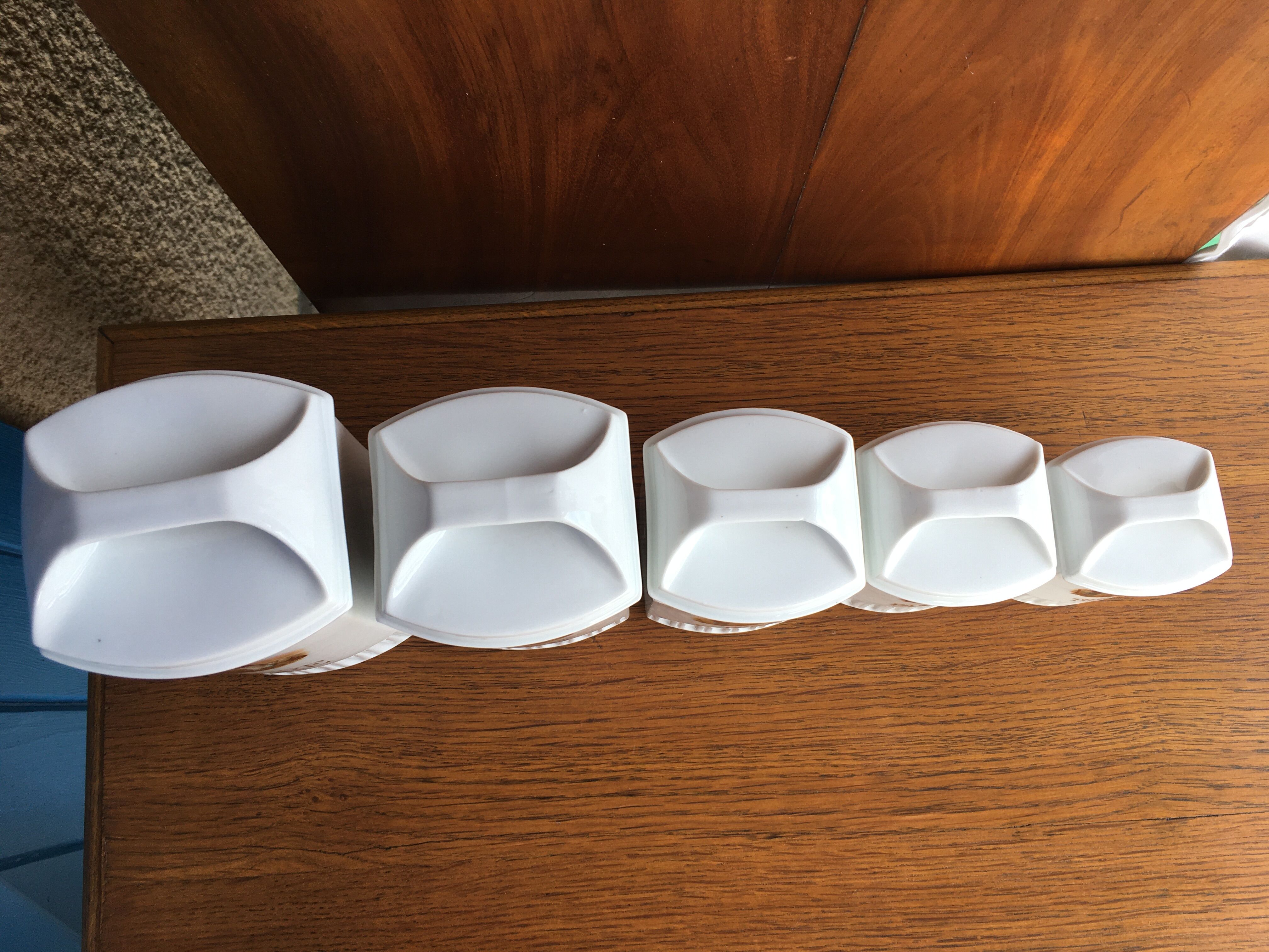 Suite of 5 old porcelain spice pots