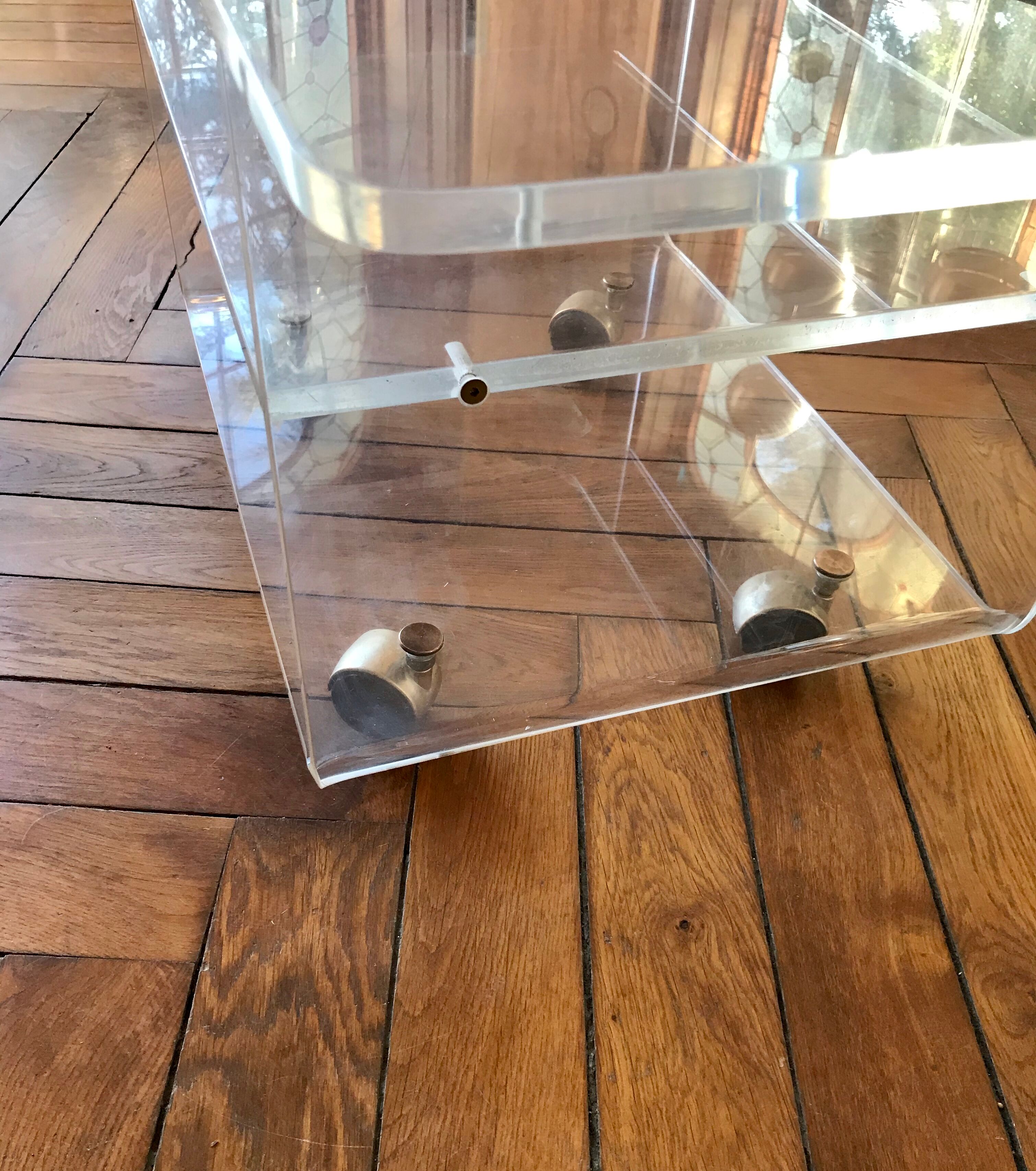 Plexiglas roller table, "Les Invisbles de Marais"