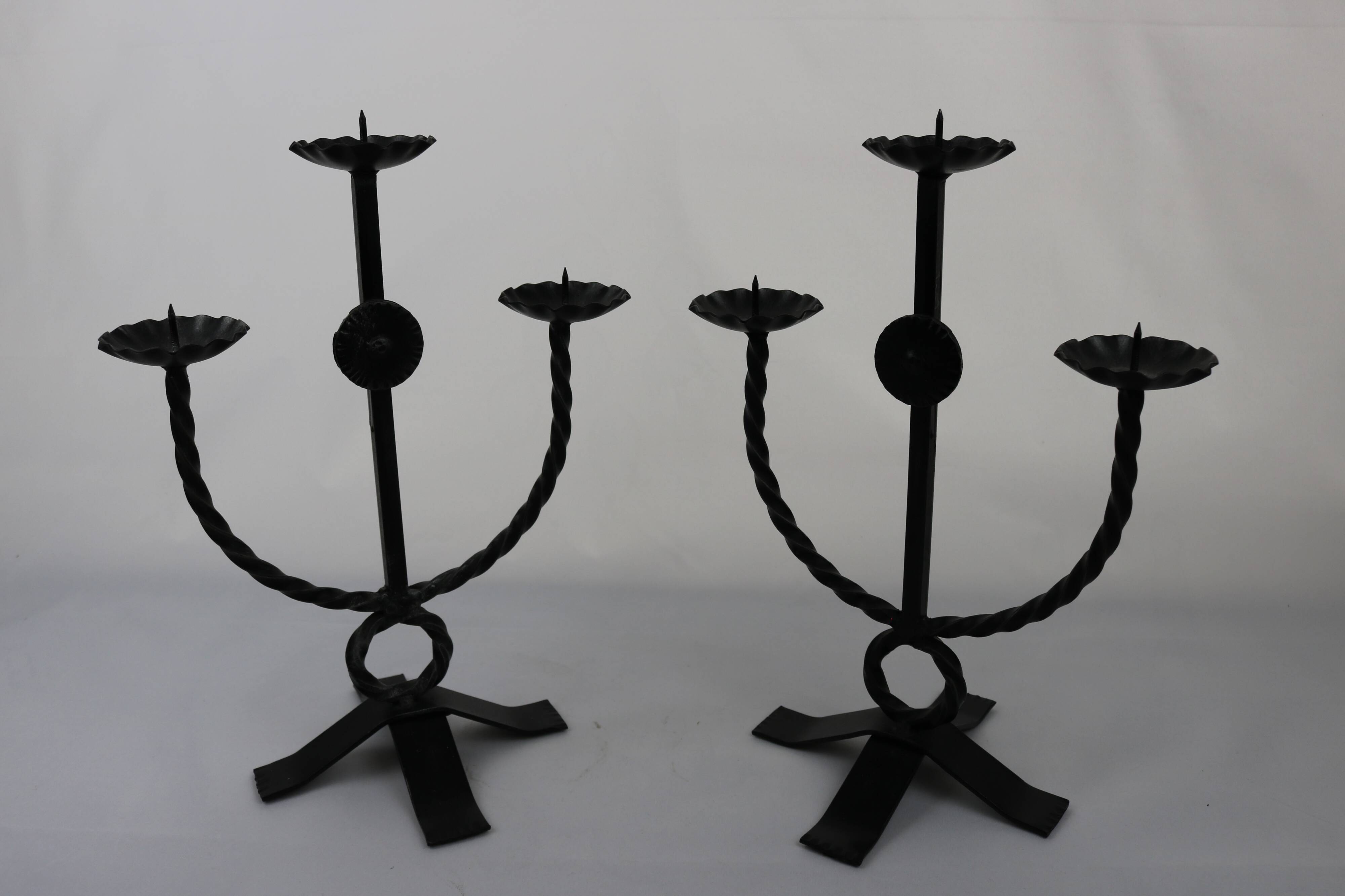 Brutalist style wrought iron candlesticks