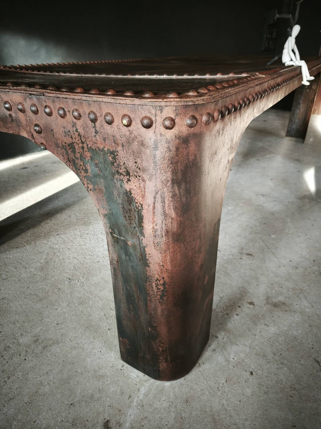 Riveted industrial table