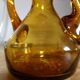 Oil and winery in amber and green sulphur glass