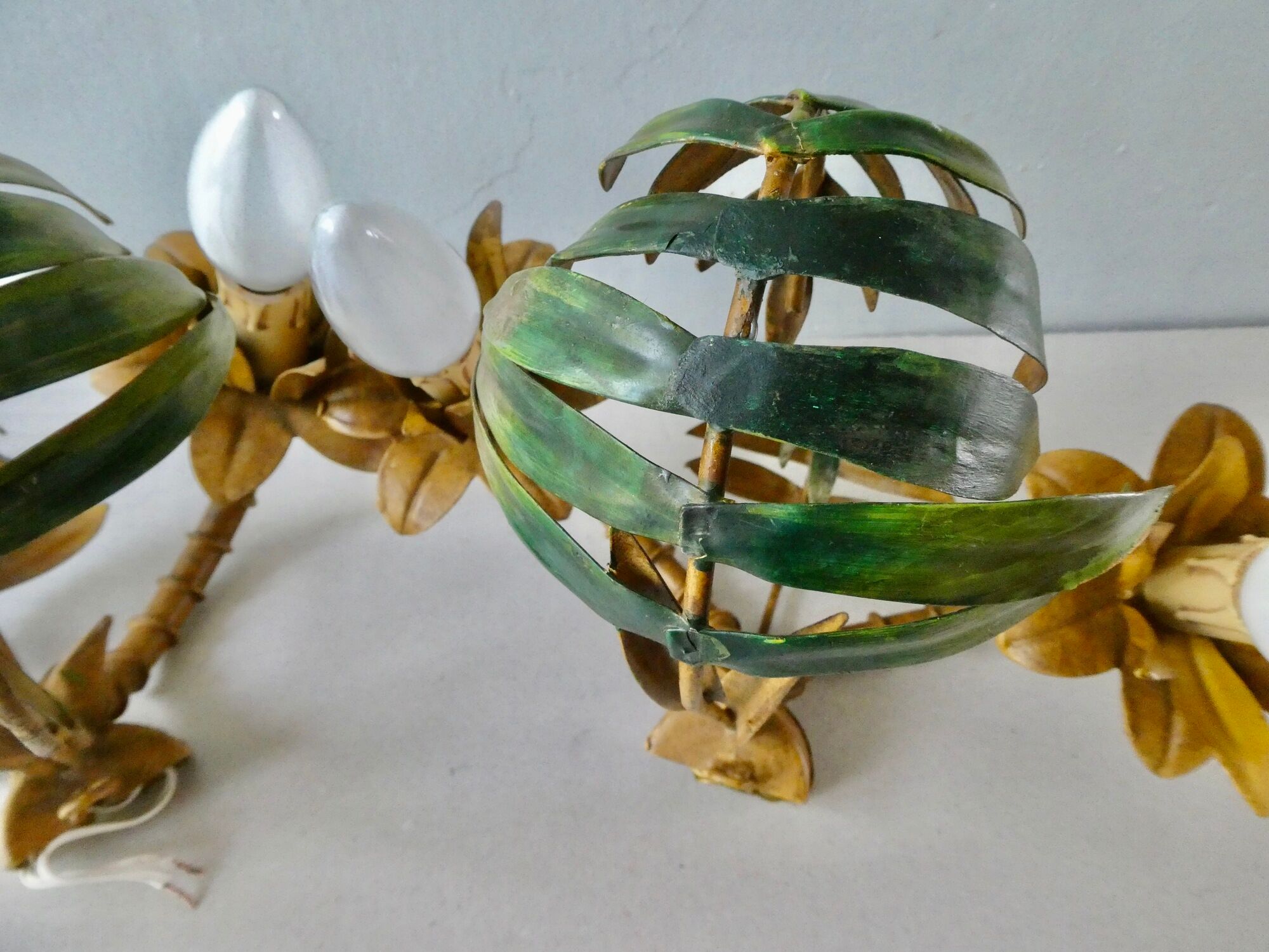 Pair of bamboo and palm sconces in metal 70s