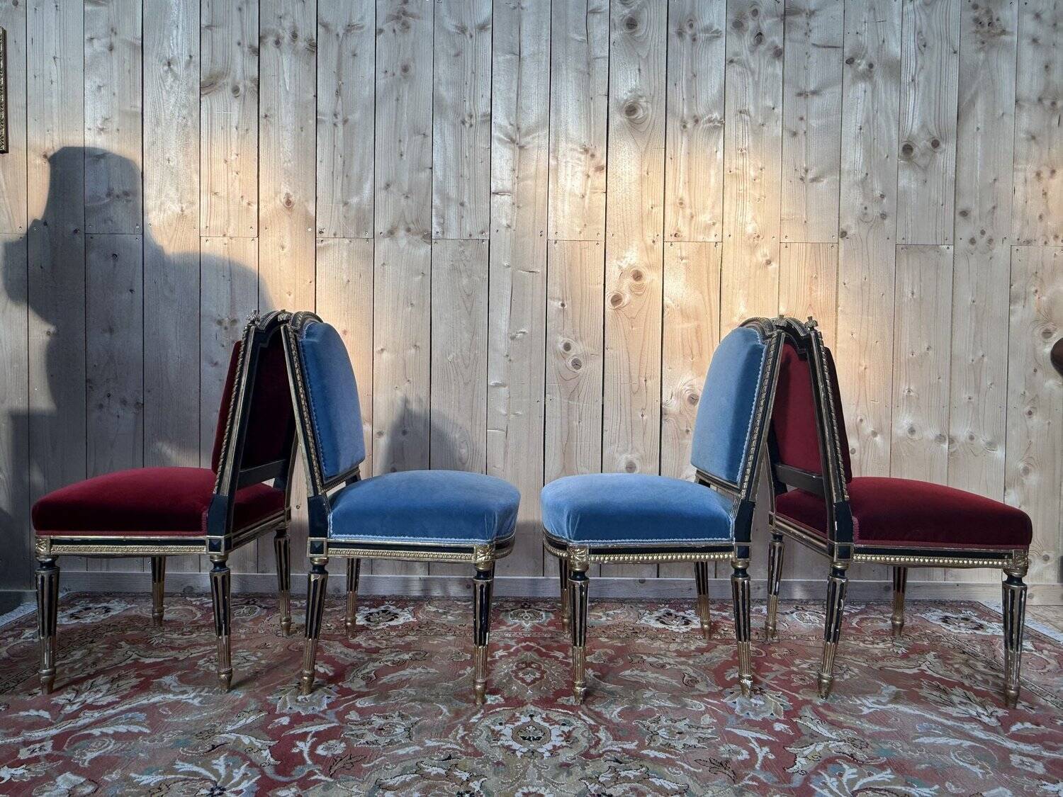 Set of 4 Napoleon III chairs in black and gold.