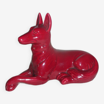 Saint Clement. Dog lying in earthenware