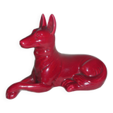 Saint Clement. Dog lying in earthenware