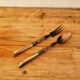 Vintage serving cutlery in horn and wrought metal